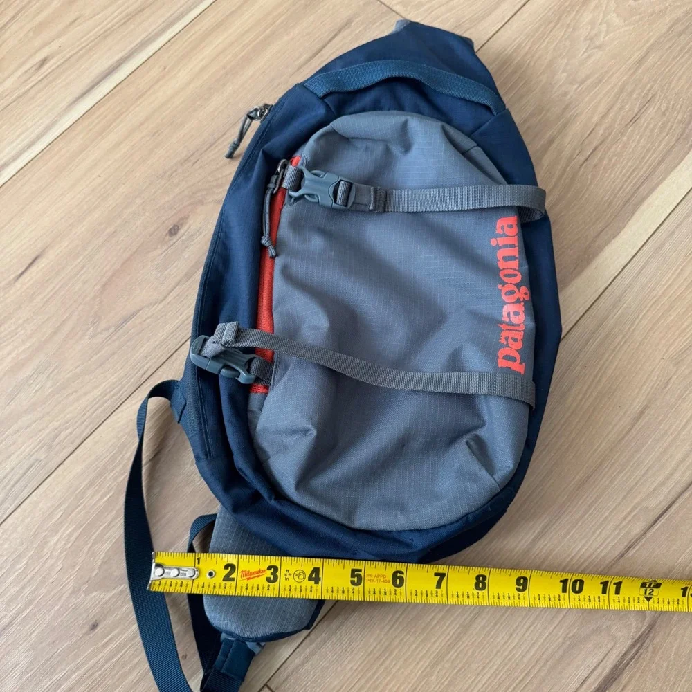 Patagonia Atom Sling 8L Backpack Sling Cross Body Bag Navy Blue Grey Orange Logo